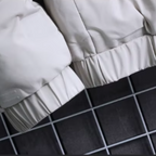 Elegante giacca in piuma da uomo