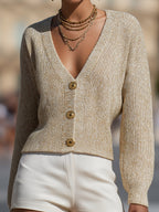 Cardigan in maglia con bottoni e filo dorato color beige champagne
